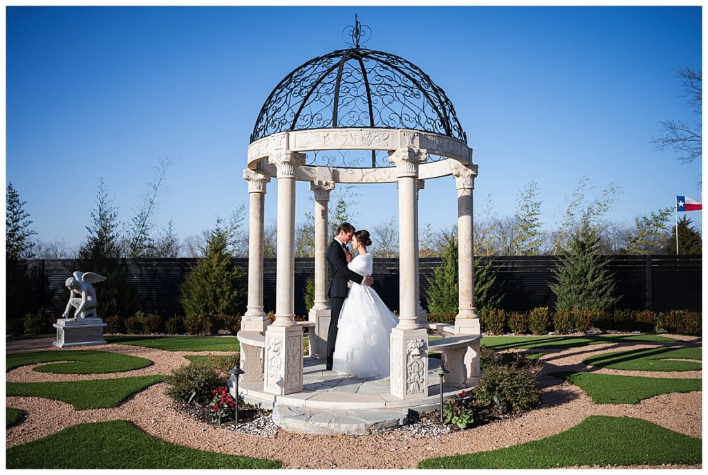 Bride and groom in gazebo at Knotting Hill wedding venue in Little Elm, Texas. 