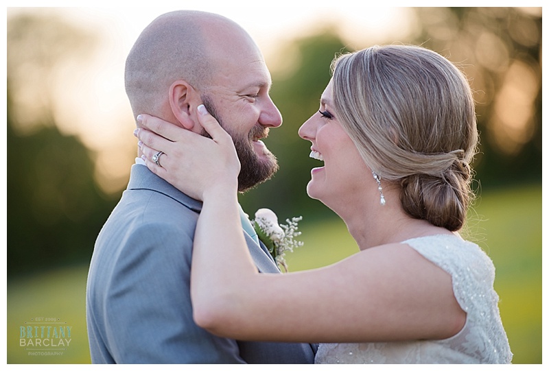 Bride and Groom laughingat Rustic Grace Estate Wedding Photos by brittanybarclay.com