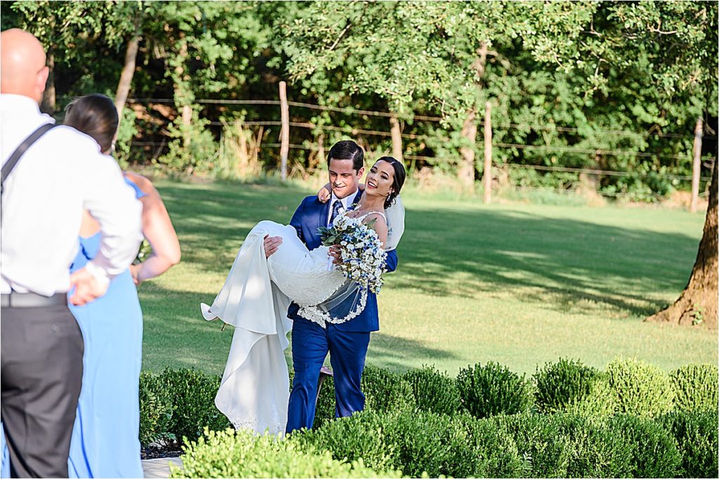 Groom scooped up his bride after the ceremony.
