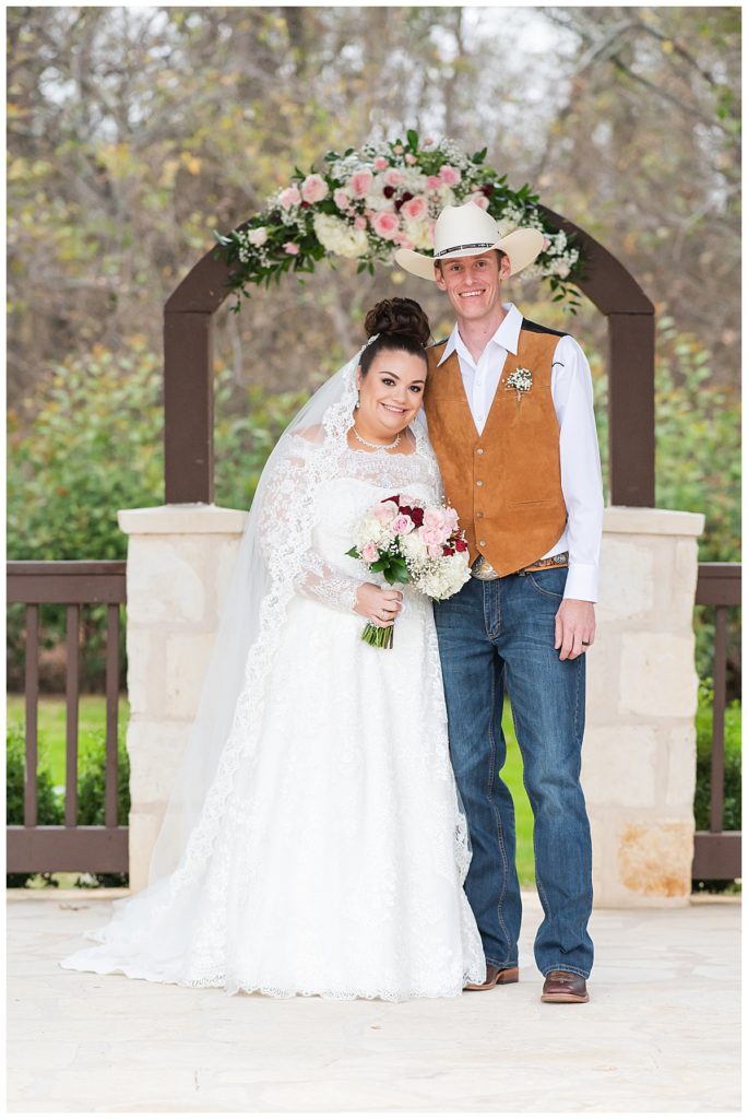 bride and groom at The ranch ceremony site